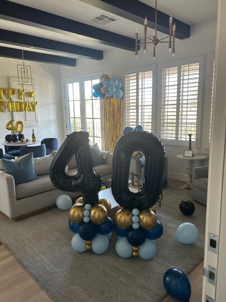 Airbnb birthday balloon number stack set up in La Quinta